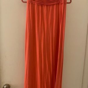 Orange long skirt.